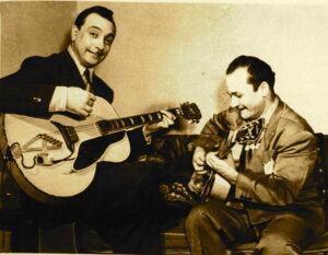 Django Reinhardt et Stéphane Grappelli jouant de la guitare